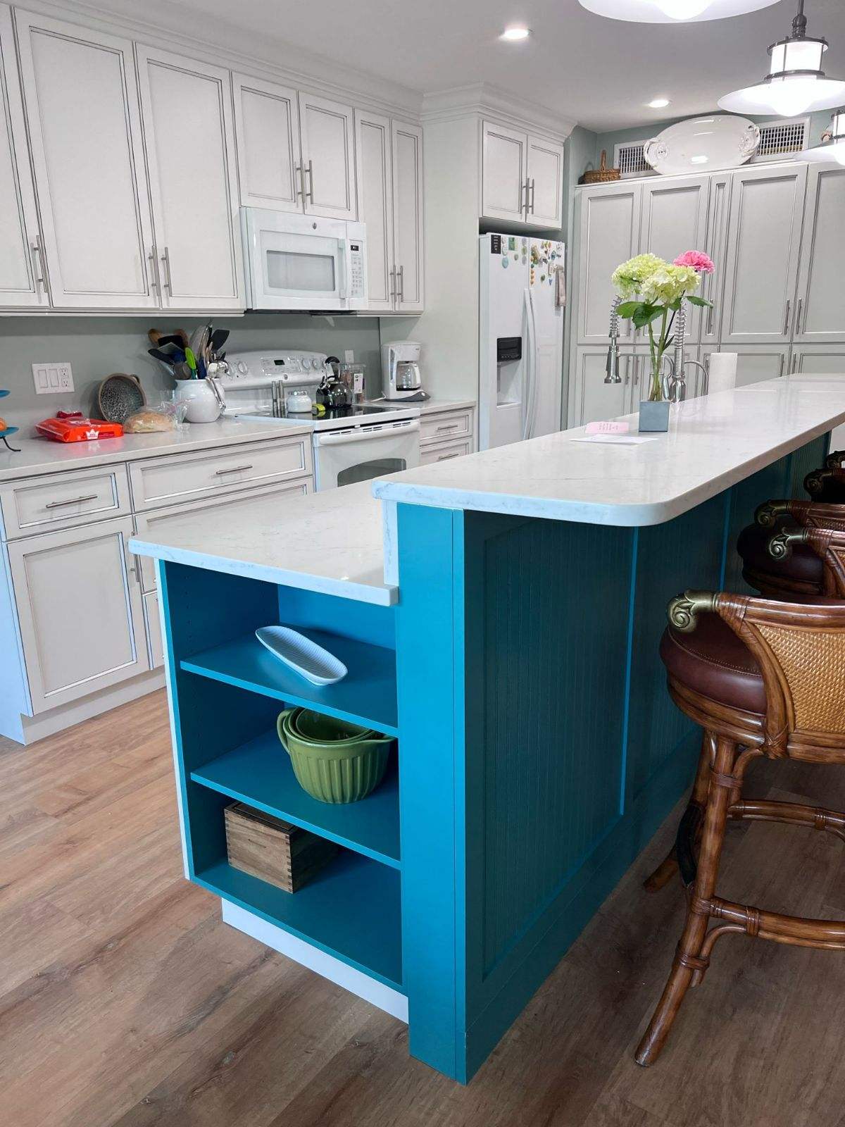 a kitchen with a blue island