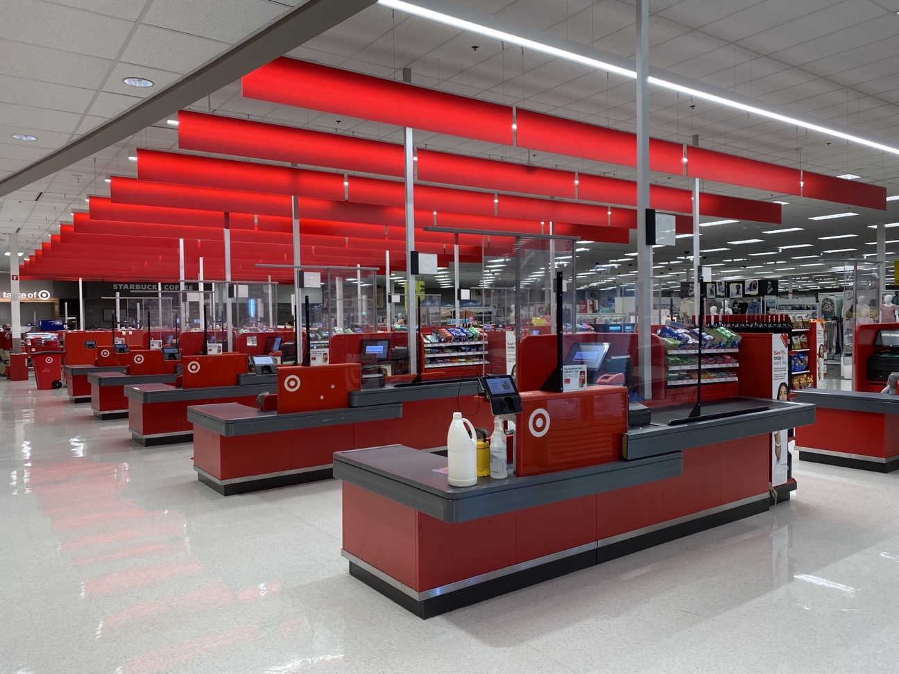 a store with red shelves and red lights