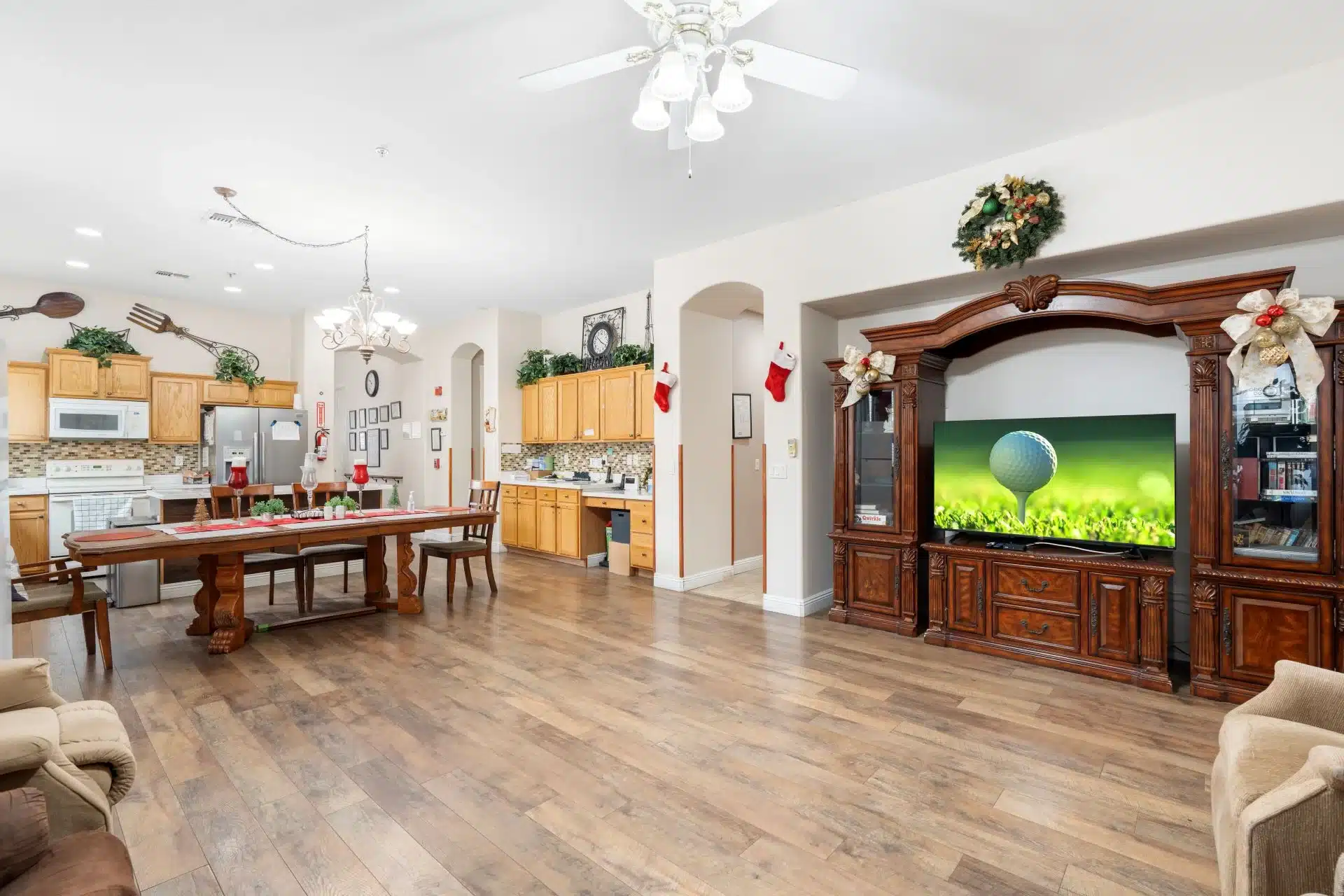 a large room with a large television and a large table