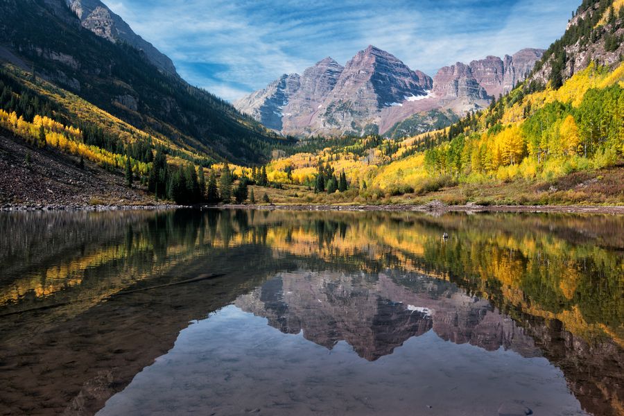 Maroon Bells range with trees and a lake