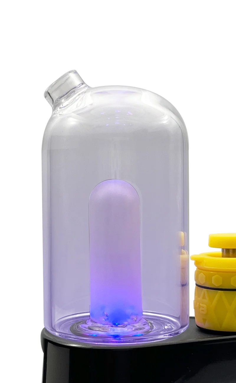 a glass container with a purple light inside