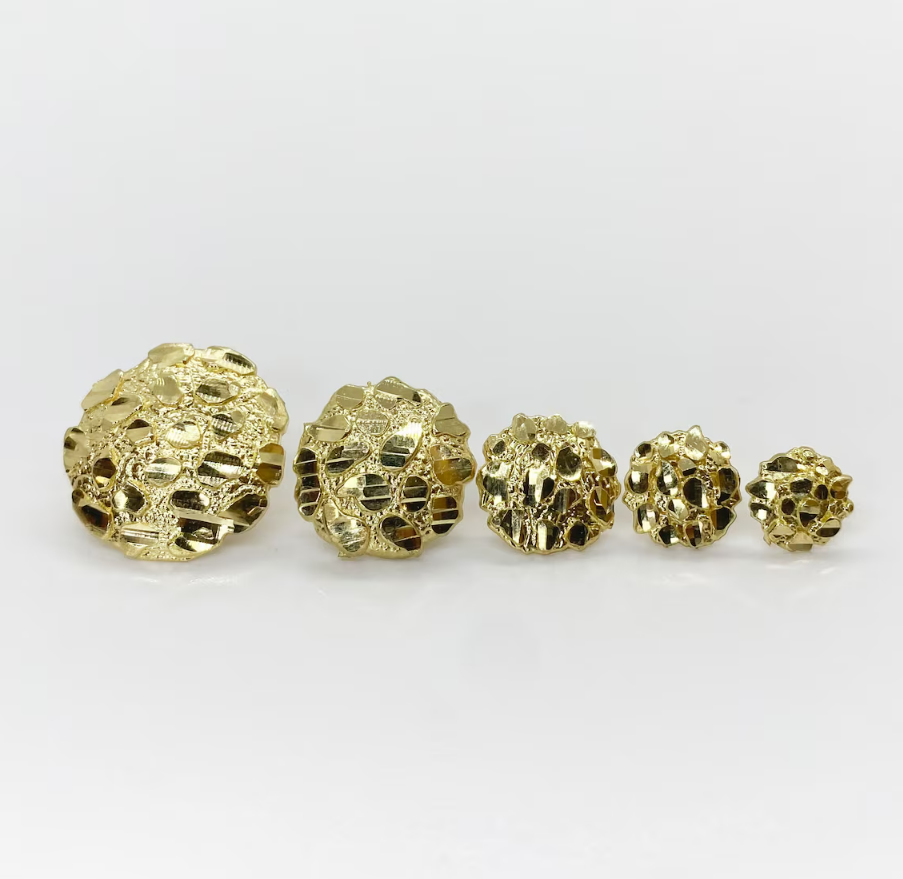 a group of gold buttons