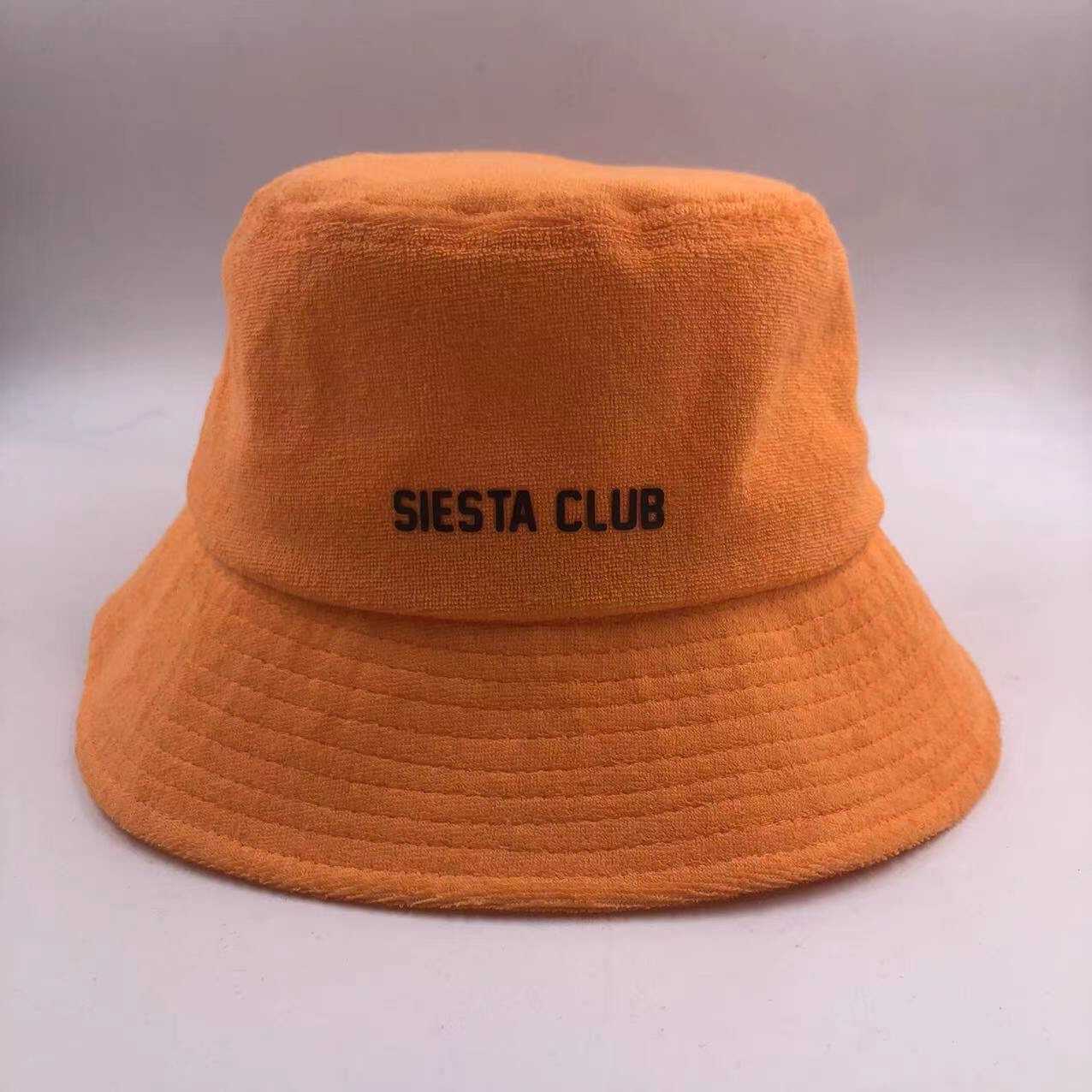 an orange hat with black text