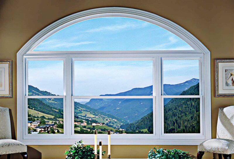 a window with a view of a valley