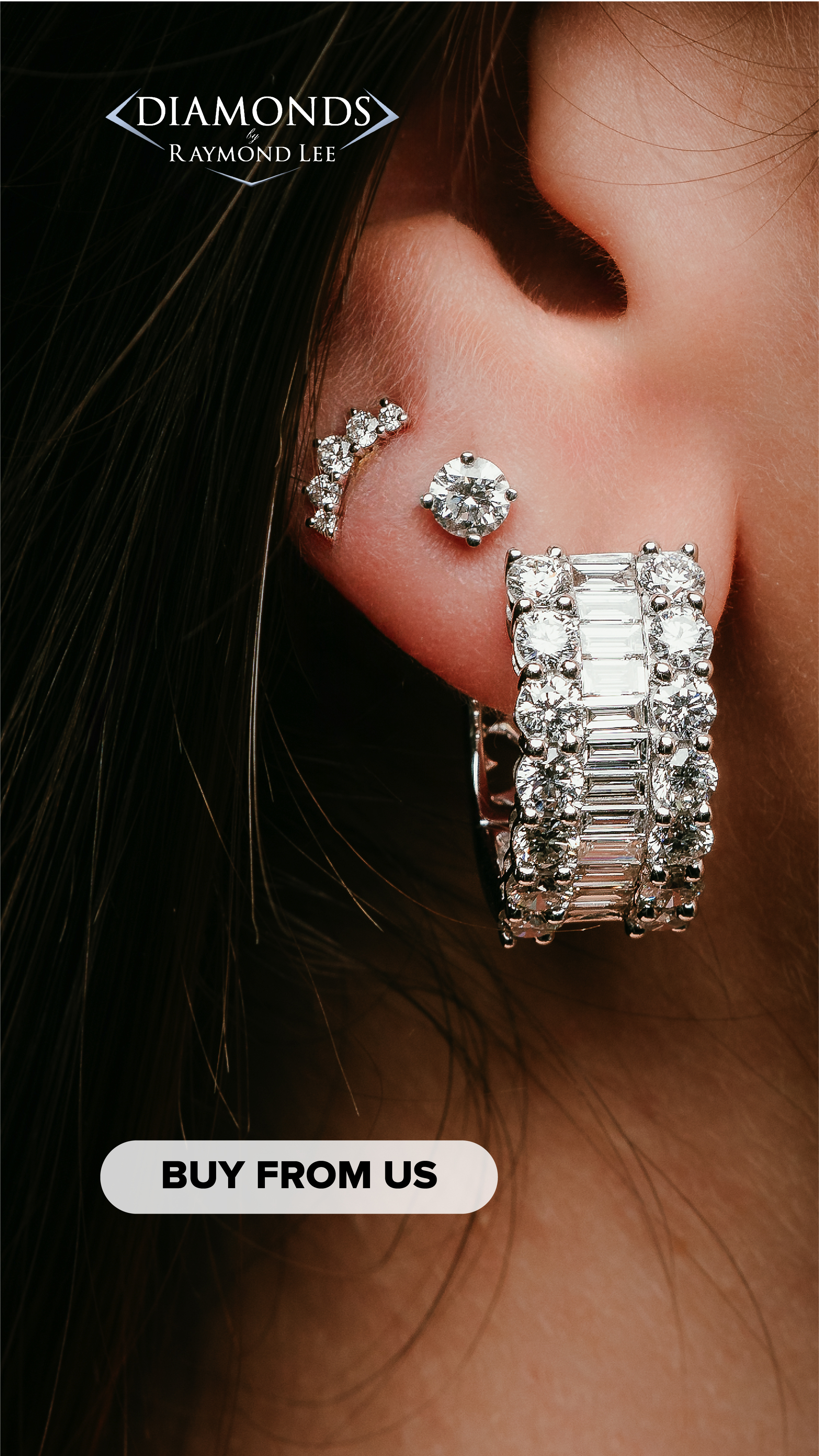 a close up of a woman's ear with a pair of diamond earrings