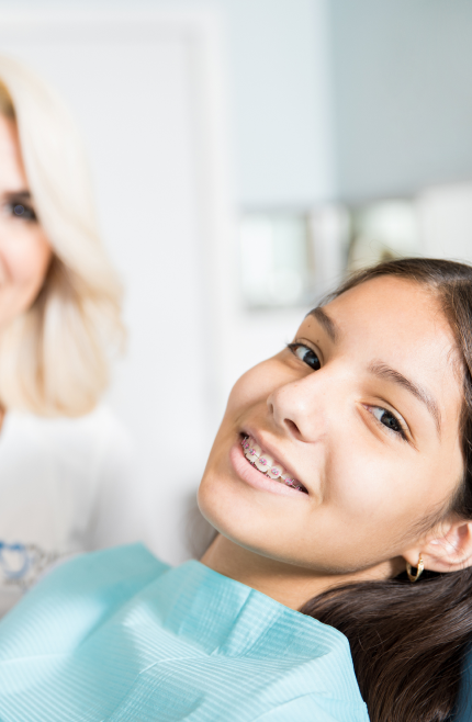 a woman smiling with braces