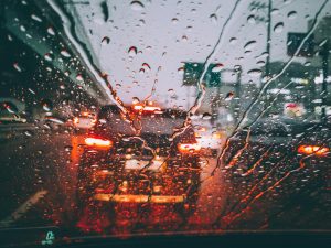 a view of a road through a car window