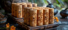 a group of wood objects with carved designs