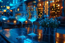 two wine glasses on a table