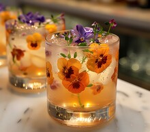 two glasses with flowers on them