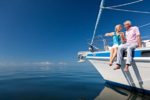 a couple sitting on a boat