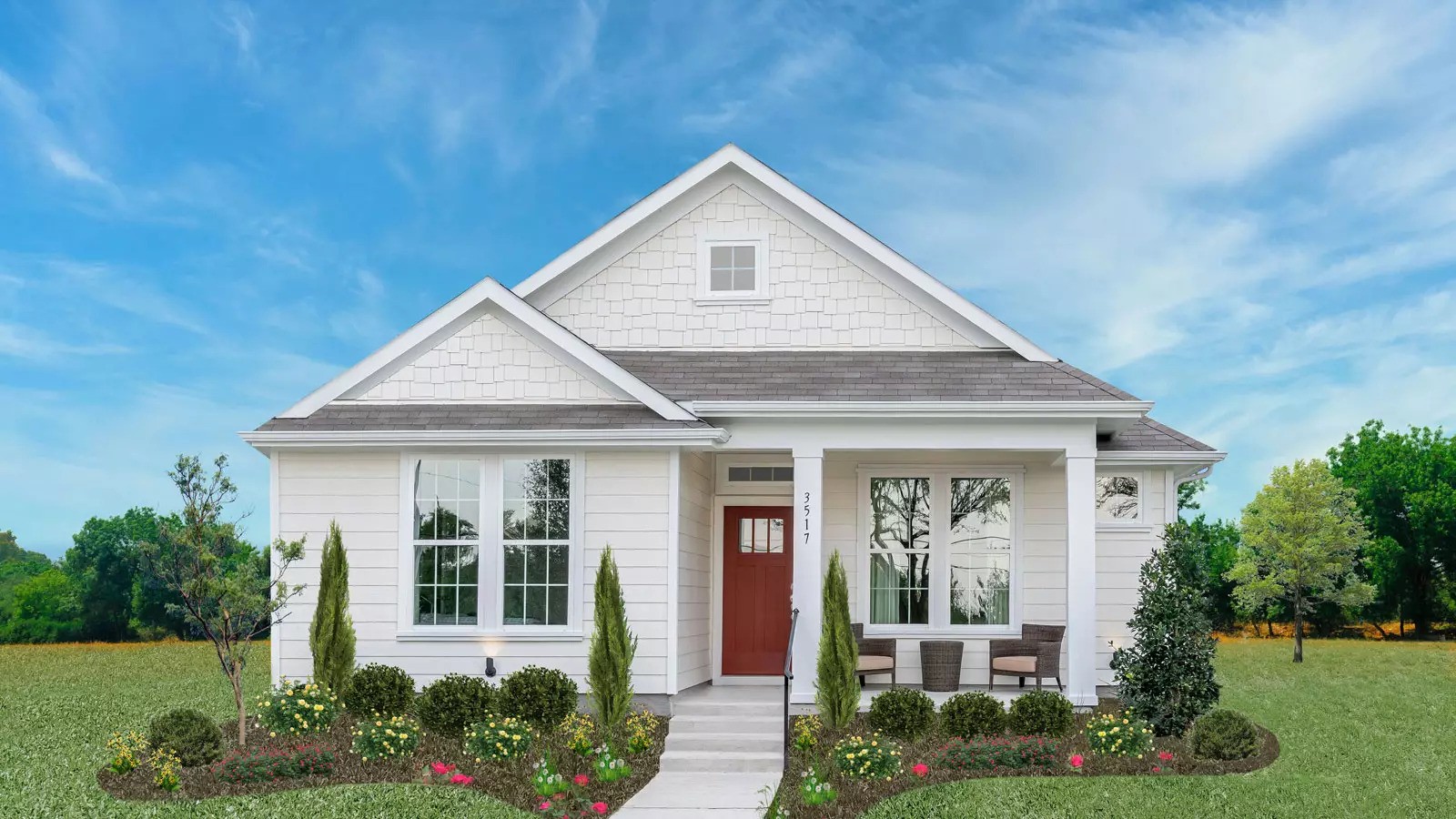 a house with a red door and a red door