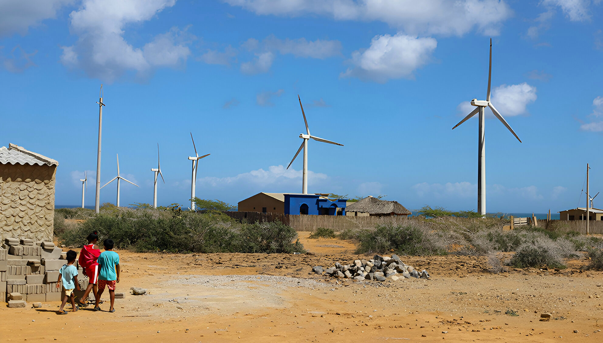 windmills in the air in front of a building