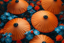 an orange umbrellas surrounded by flowers