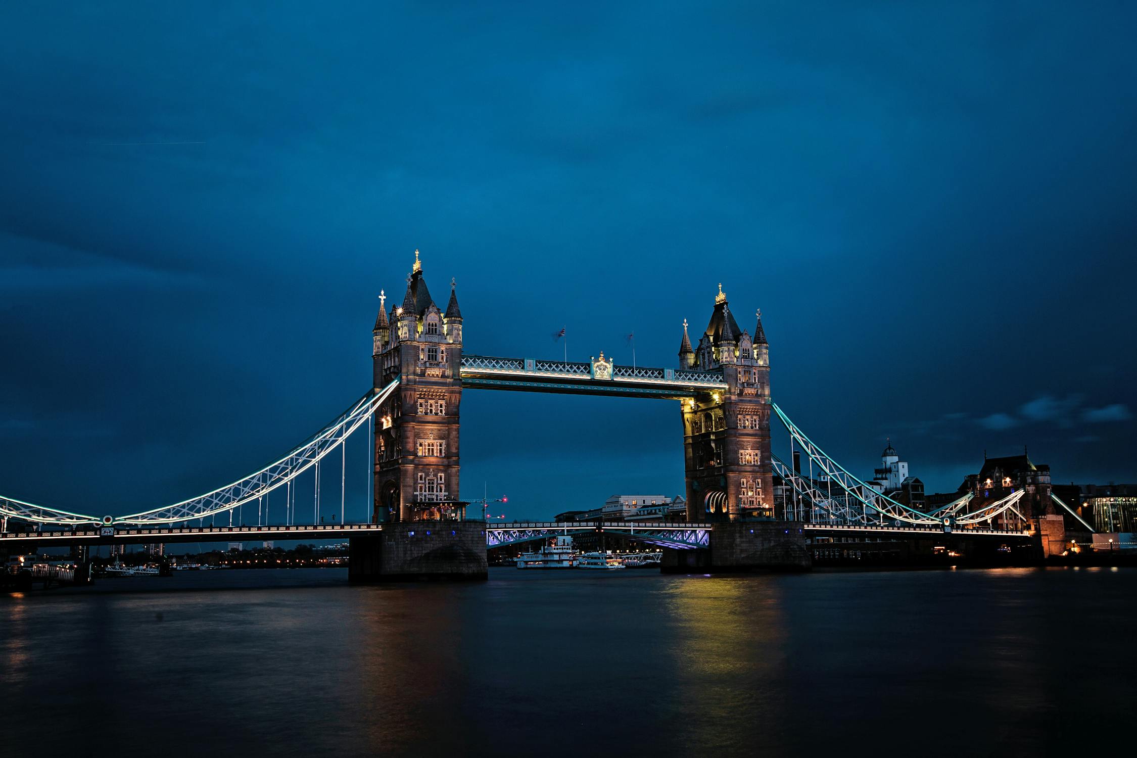 Tower Bridge with towers and lights at night