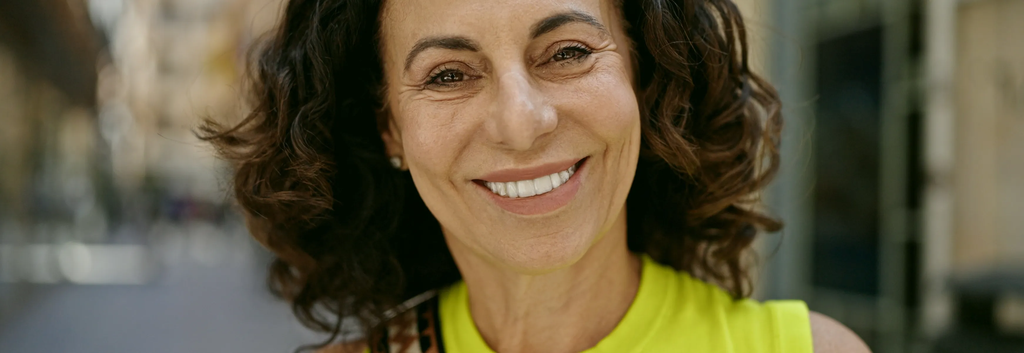 a close up of a woman smiling