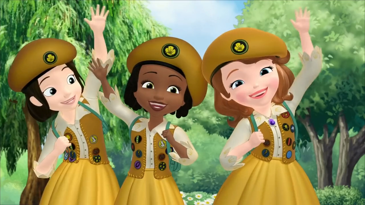 a group of girls wearing yellow dresses and hats