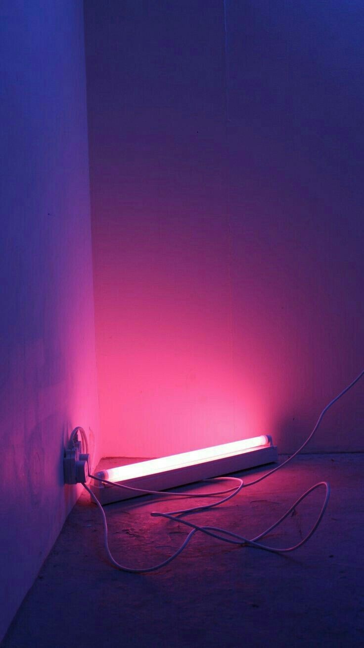 a pink light in a corner