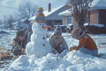 a group of children building a snowman