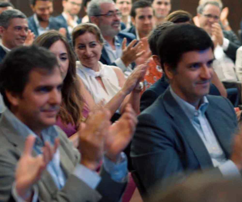 a group of people clapping