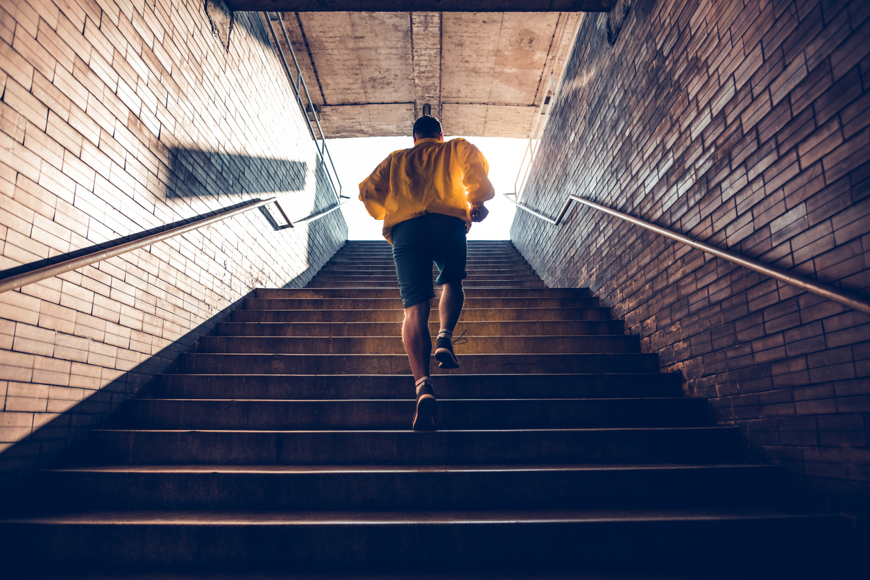 a man walking up stairs