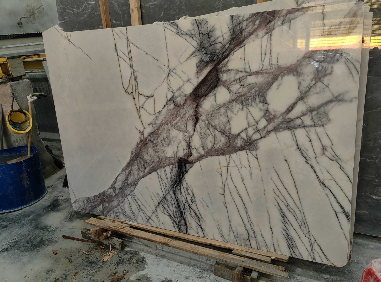 a large white and black marble slab