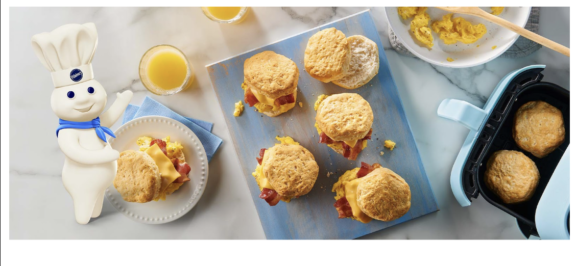 a breakfast sandwich on a cutting board