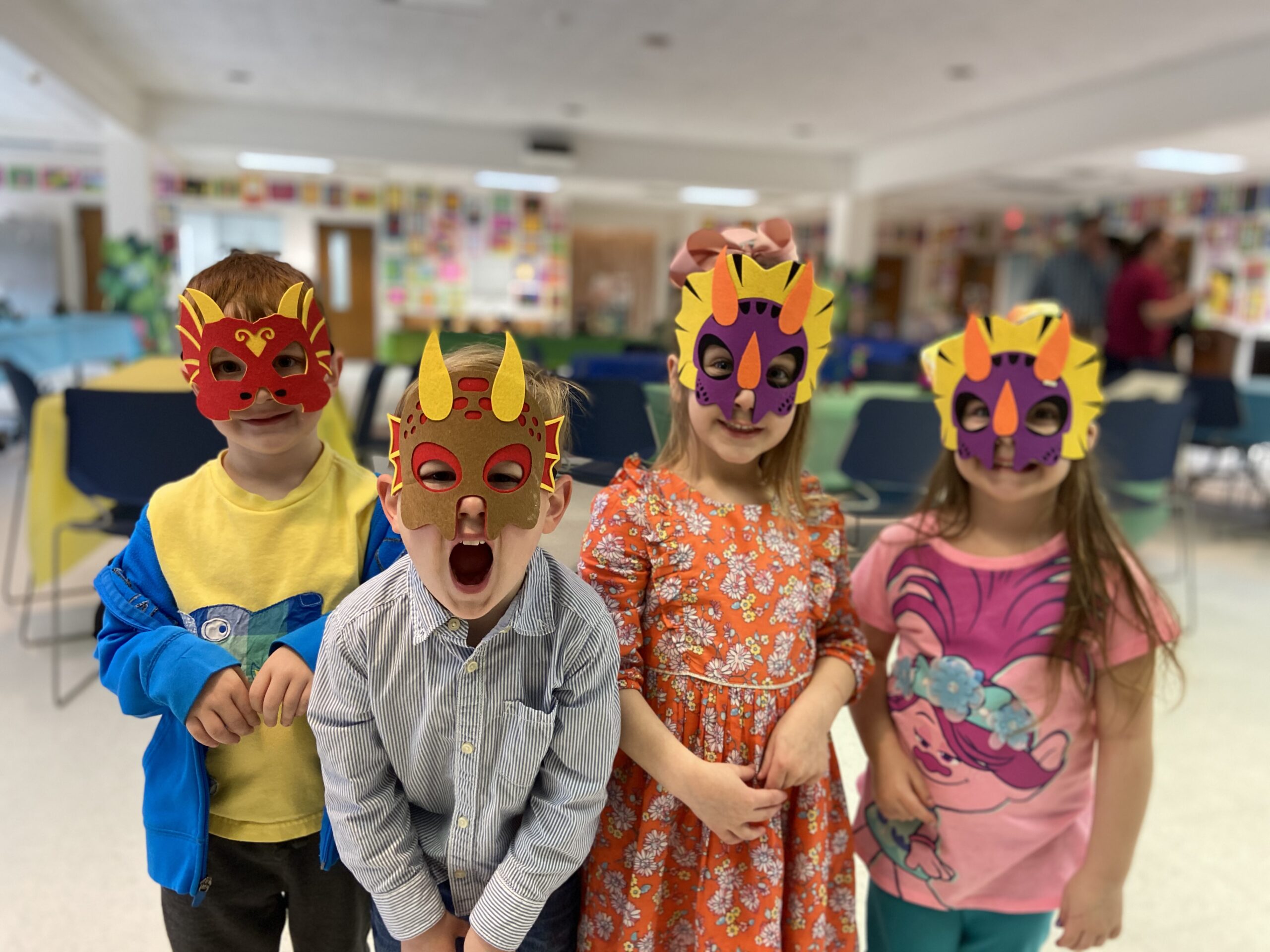 a group of kids wearing masks