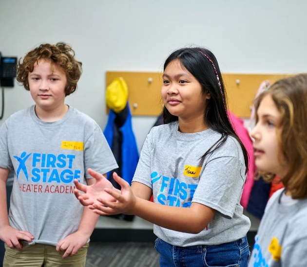 a group of kids in a room