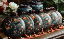 a row of round objects with flowers on them