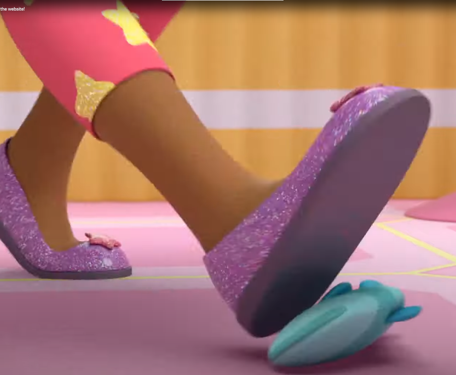 a cartoon character feet stepping on a toy