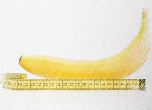 a banana and a measuring tape