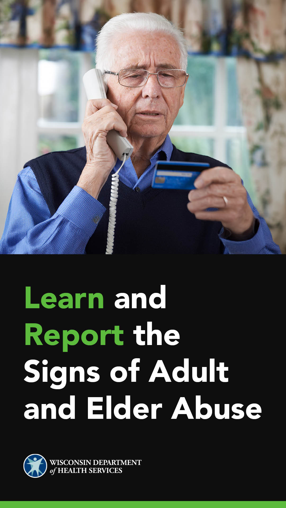 an older man holding a phone and a credit card