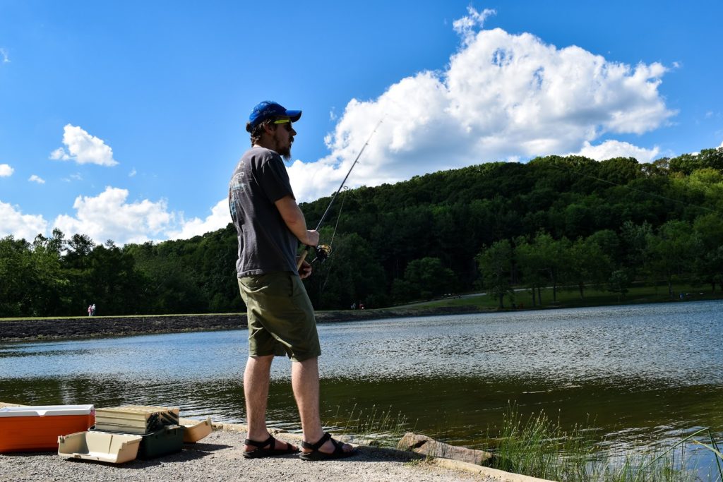 a man fishing on a lake