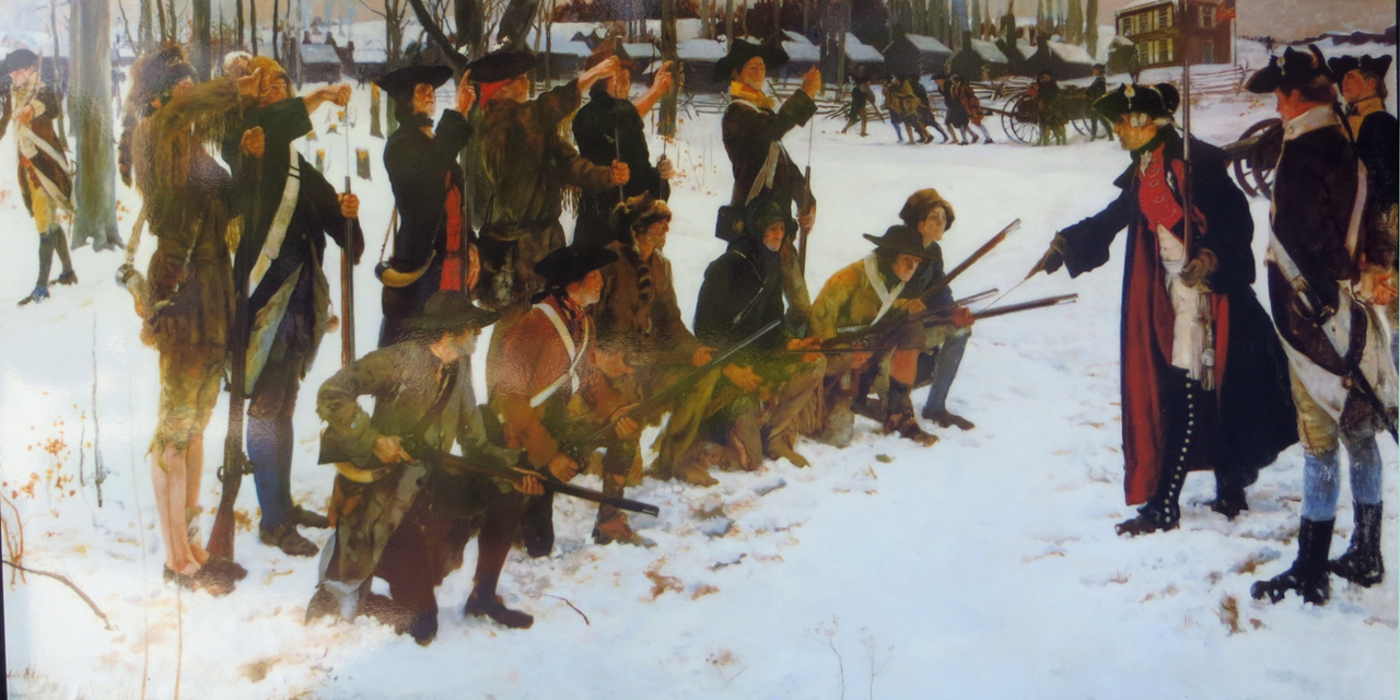 a group of people holding guns in the snow