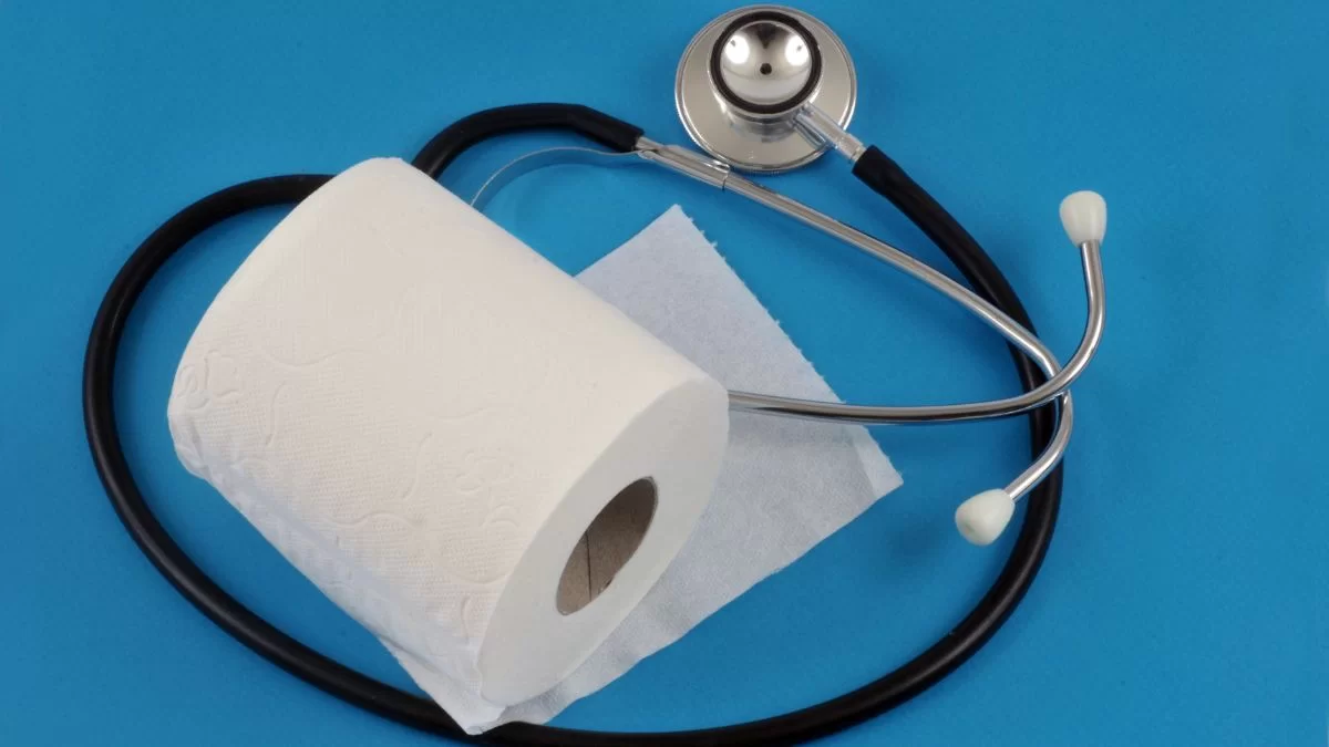 a roll of toilet paper and a stethoscope