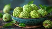 a bowl of green fruit