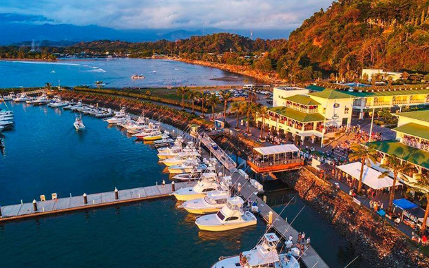 a marina with boats and a body of water