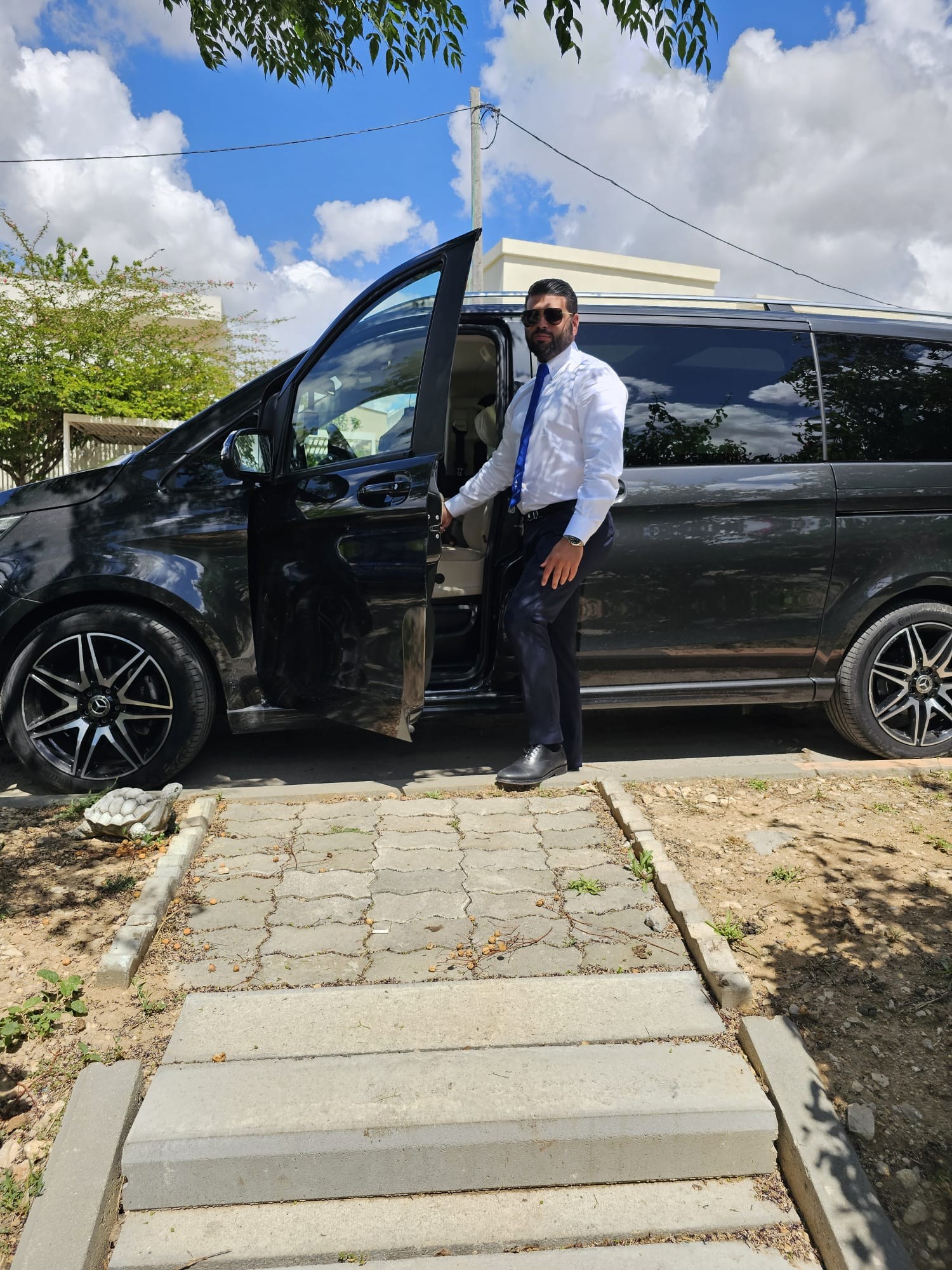 a man standing in front of a van