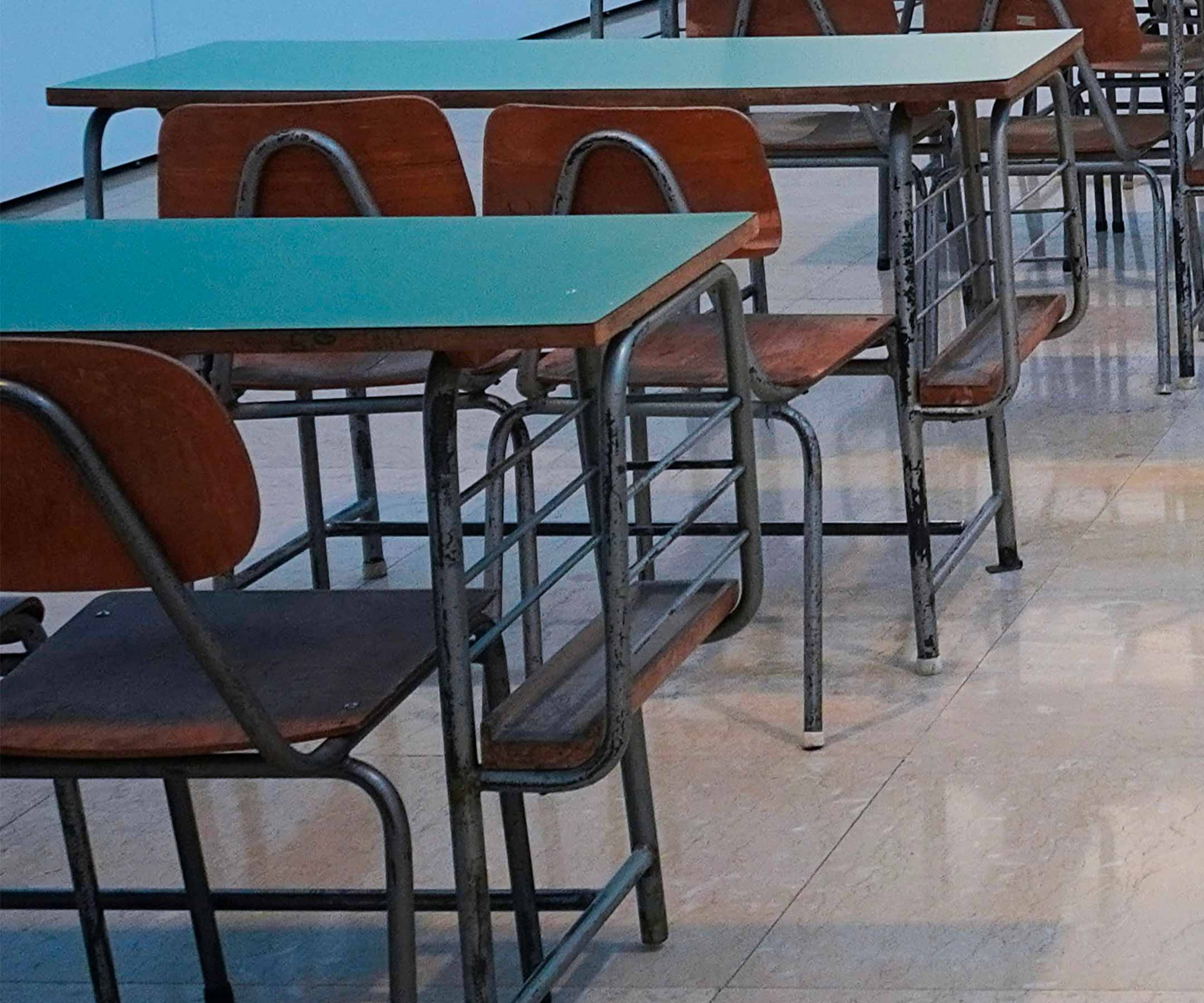 a desks and chairs in a classroom