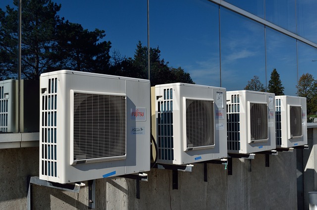 a row of white air conditioners