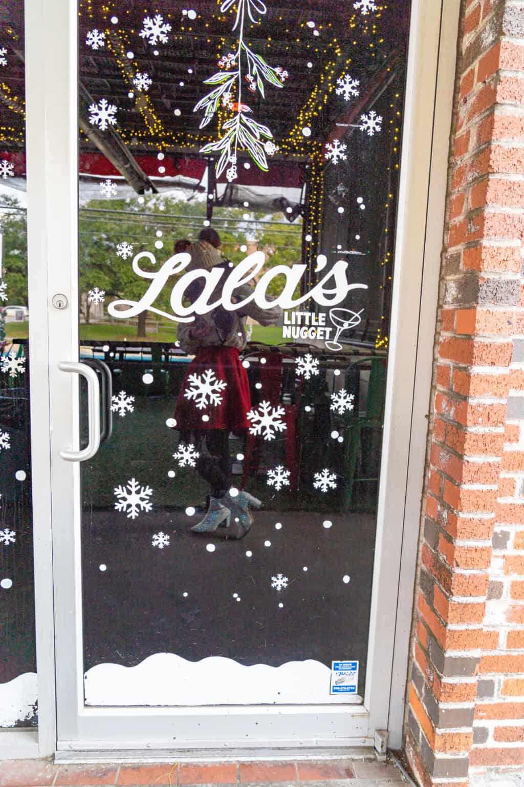 a glass door with decals on it