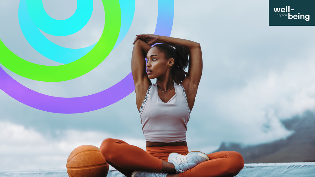 a woman sitting on the ground with a basketball and a colorful swirl