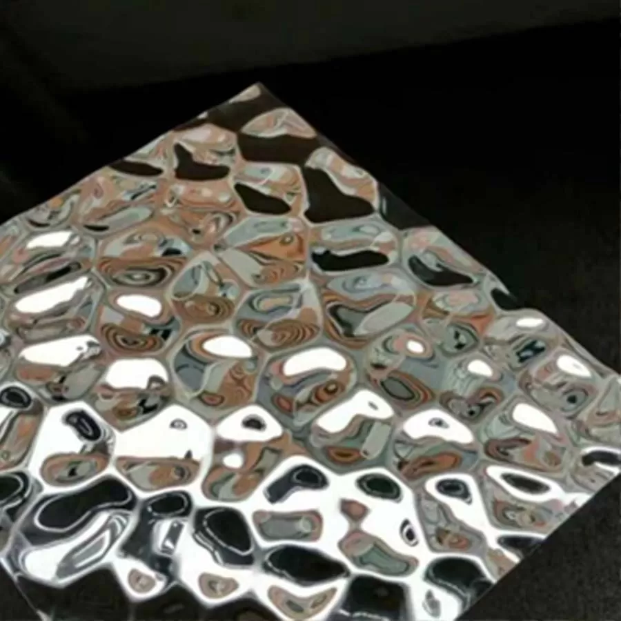 a shiny silver square object