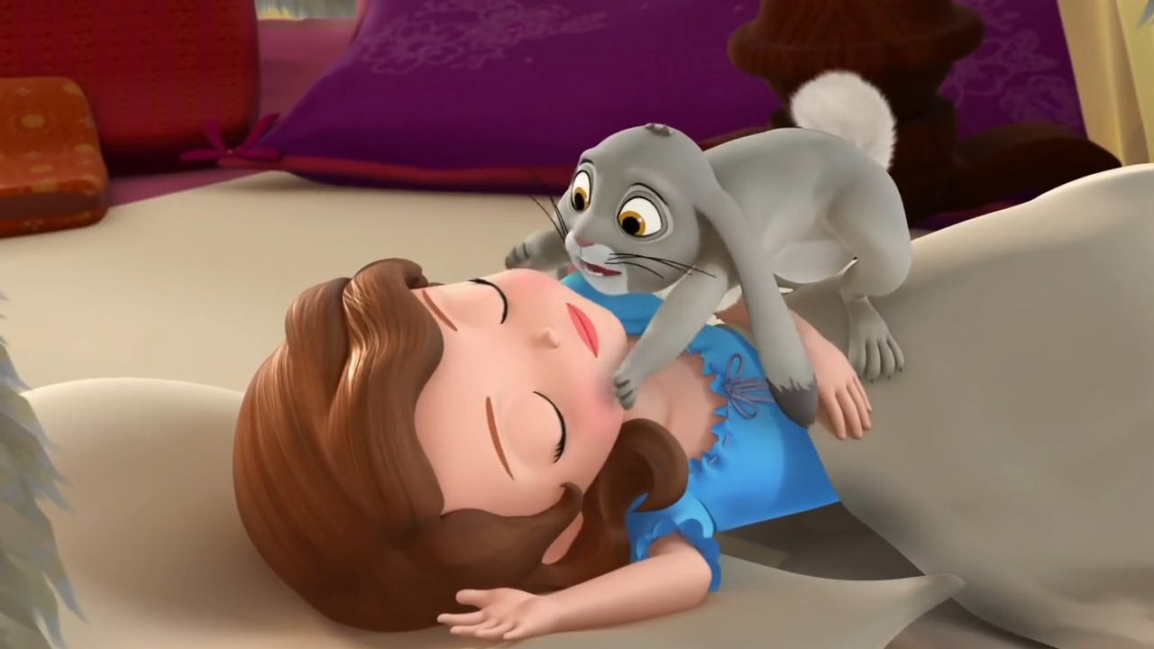 a cartoon character lying on a bed with a rabbit