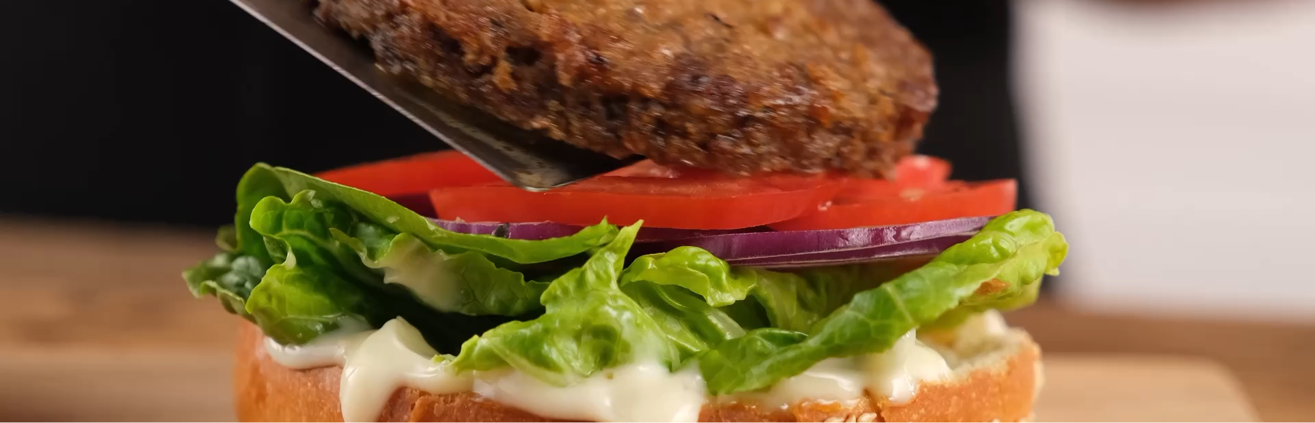a close up of a burger