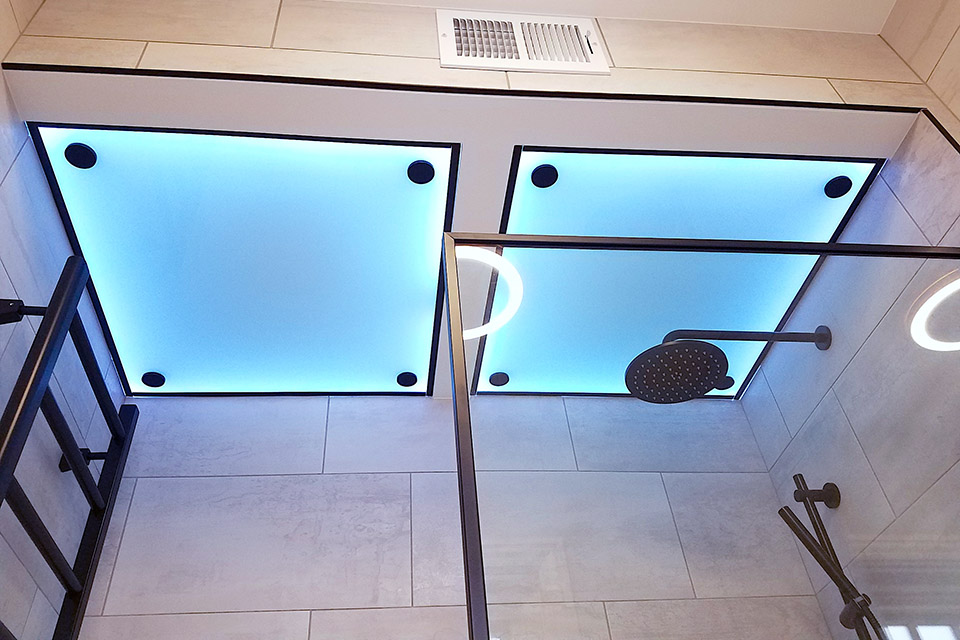 a shower with blue lights