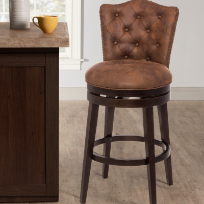 a brown chair next to a counter