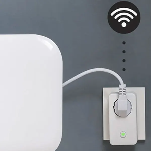 a white rectangular object with a white cord plugged into a wall