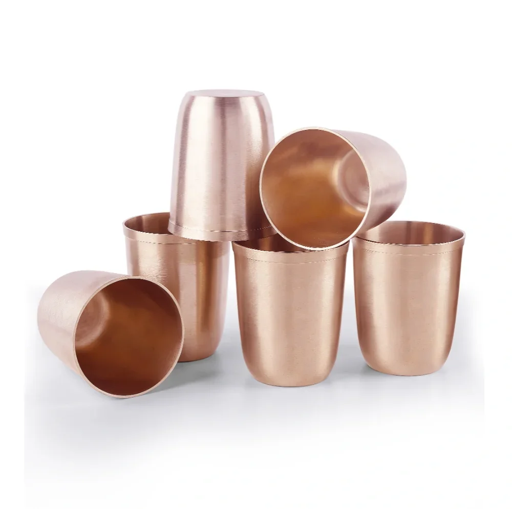 a group of copper cups